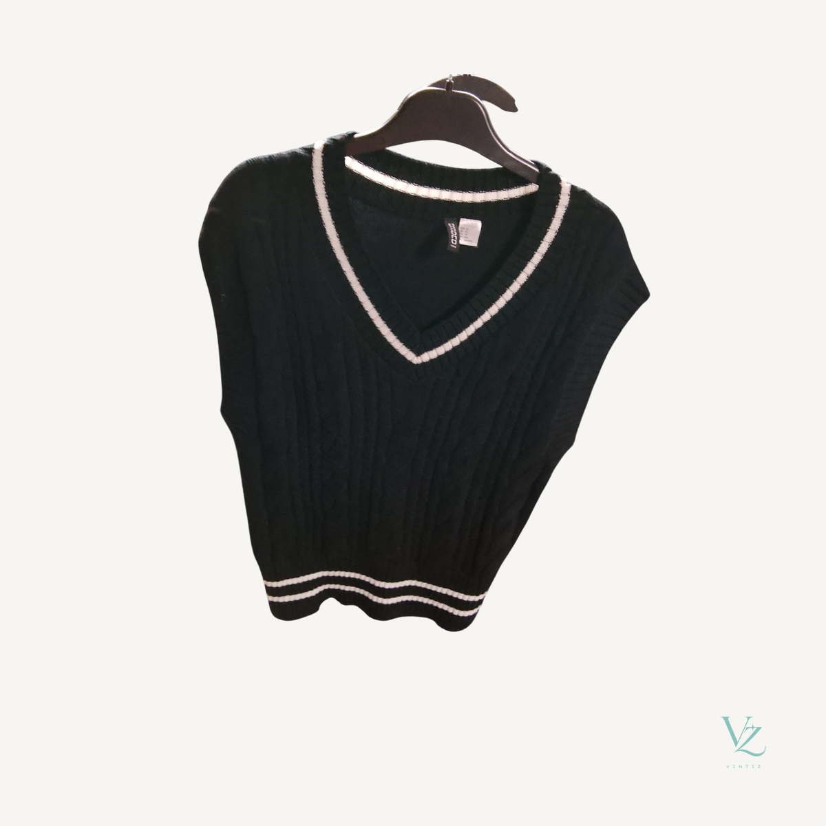 H&M — Pull sans manche H&M